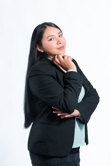 Professional portrait of a confident business woman in formal attire, perfect for corporate themes.