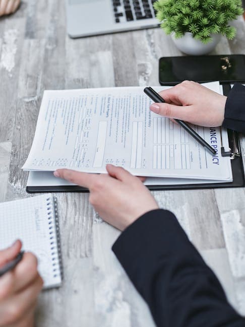 Michigan insurance professional reviewing materials related to michigan insurance ce requirements: complete guide.