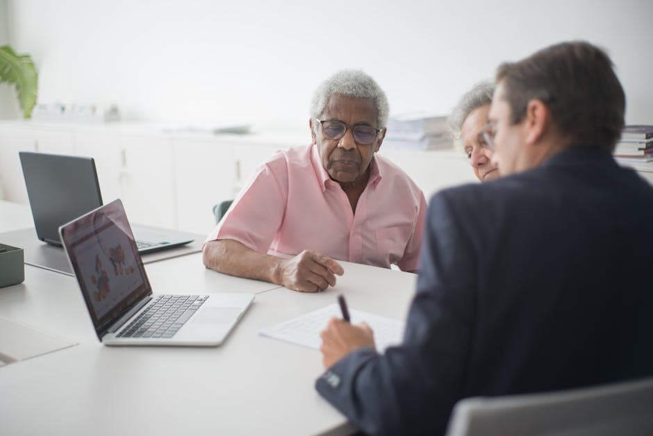 Georgia insurance professional reviewing licensing materials in a bright, modern office.