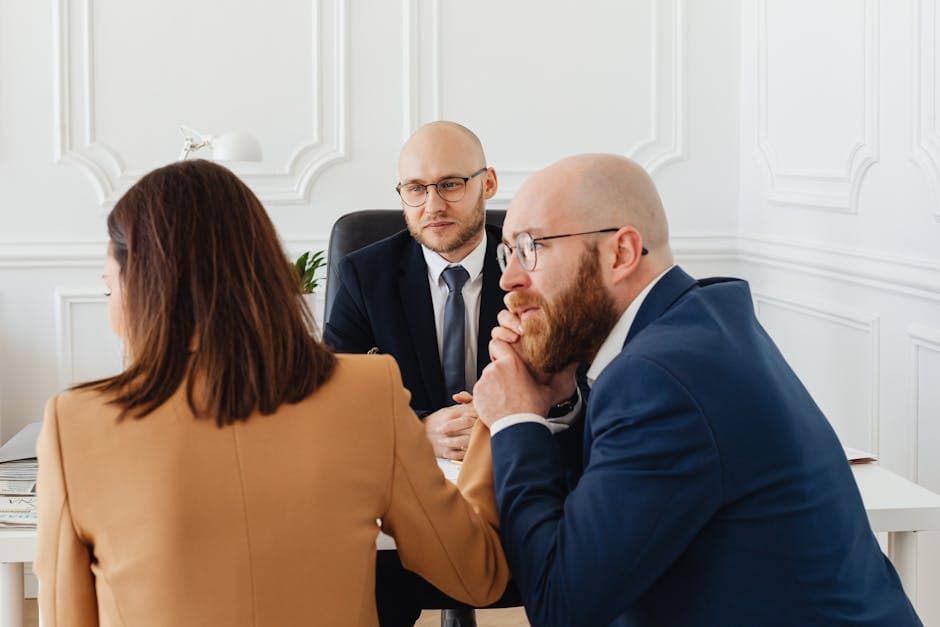 Georgia insurance professional reviewing licensing materials in a bright, modern office.