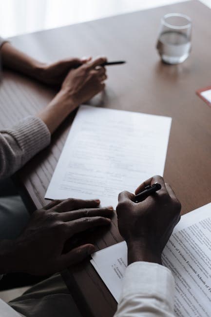 Texas insurance agent reviewing licensing materials related to what happens if you fail the texas insurance exam? retake rules explained.