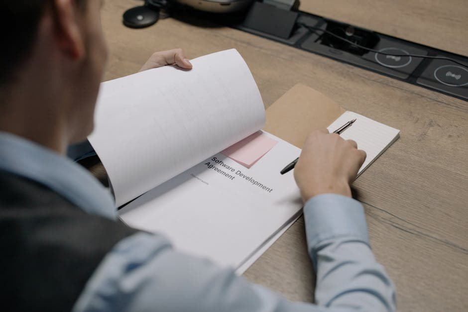 Texas insurance agent reviewing licensing materials related to texas fingerprinting for insurance: where to go and what to expect.