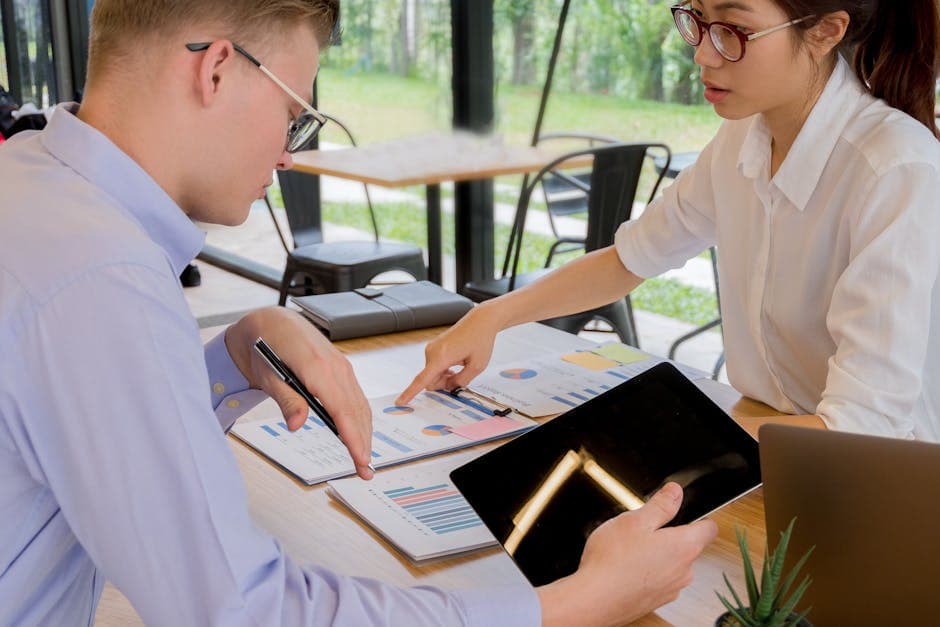 Washington insurance professional reviewing materials related to washington insurance ce requirements: complete guide.