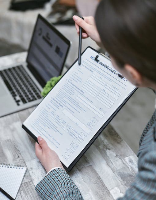 Florida insurance professional reviewing licensing materials in a bright, modern office.